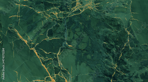 green marble with golden veins. green golden natural texture of marble. abstract green, white, gold and yellow marbel. hi gloss texture of marble stone for digital wall tiles design.  © Marble Texture