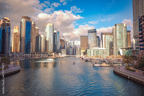 Beautiful view of the waterway that passes through the middle of the Dubai Marina district, surrounded by tall skyscrapers, Dubai, UAE