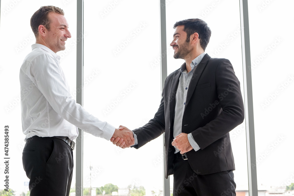 businessman and partnership handshaking in meeting room businessman and partnership handshaking in meeting room