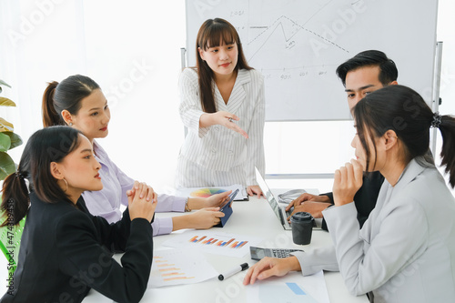 Asia business in seminar or employees group meeting in a conference room