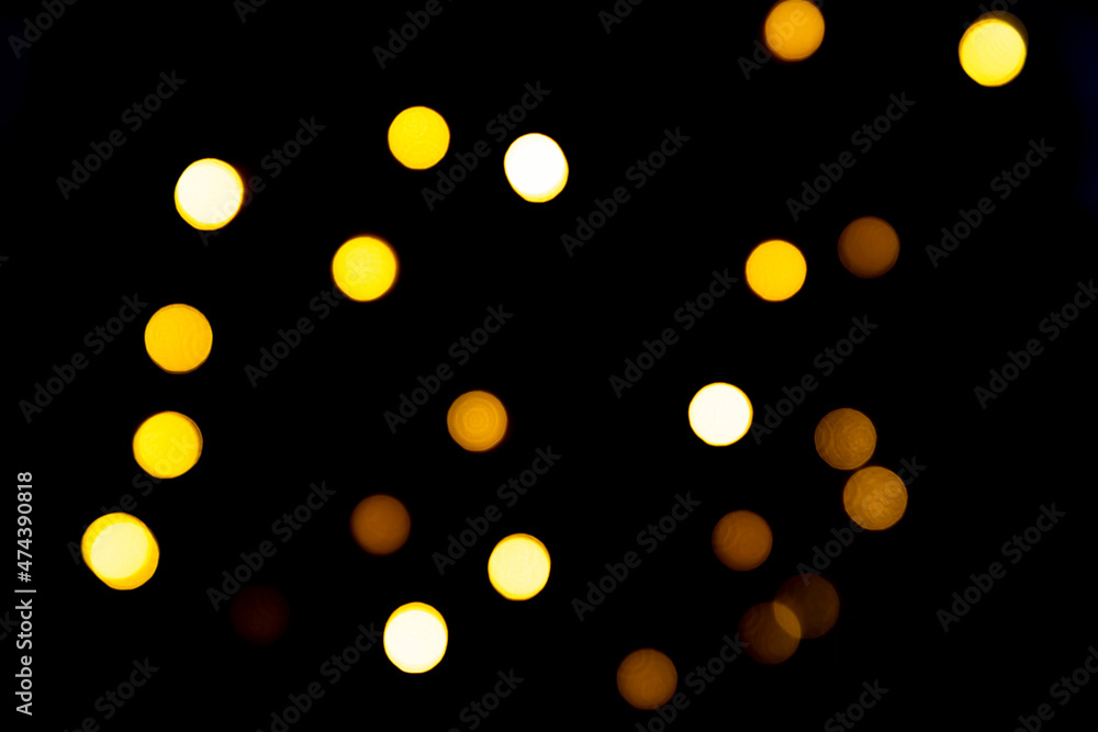 Christmas or New Year yellow blurred textured bokeh lights background Christmas or New Year yellow blurred textured bokeh lights background