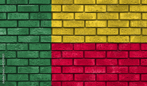 Benin flag on a brick wall