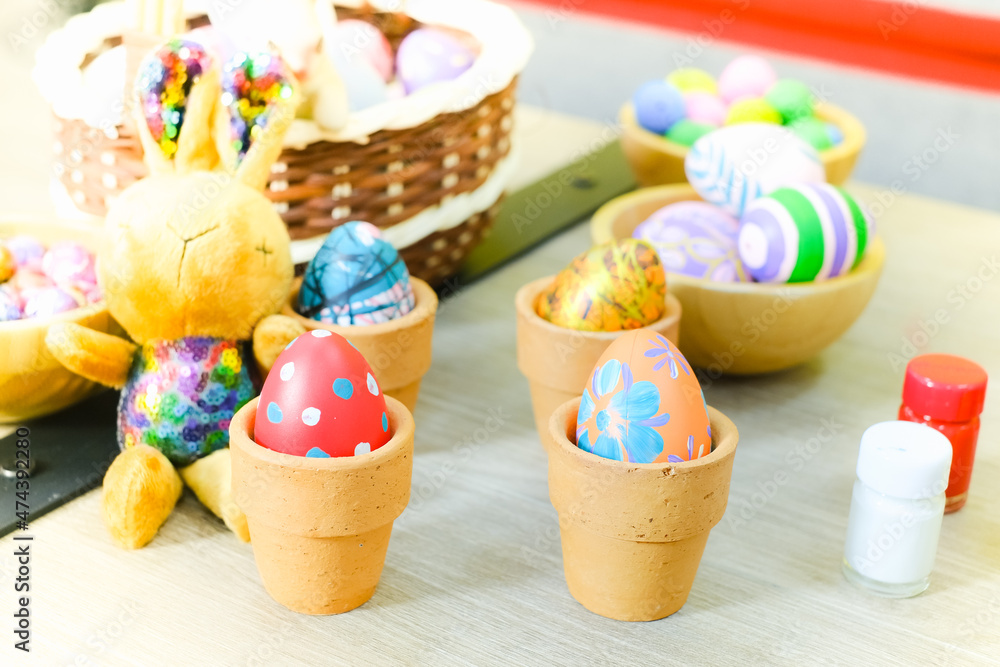 Colorful easter eggs in Basket