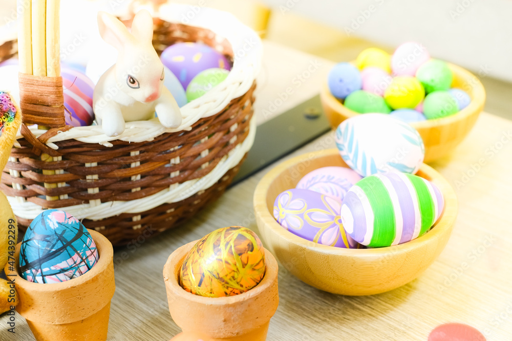 Colorful easter eggs in Basket Colorful easter eggs in Basket