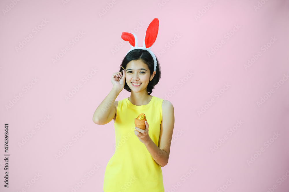 Portrait beautiful young asia girl with painted eggs, Happy easter day Portrait beautiful young asia girl with painted eggs, Happy easter day
