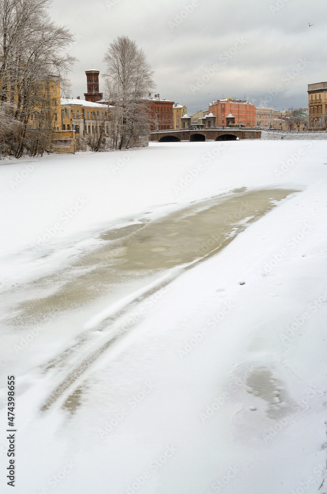 Frozen river in the city.