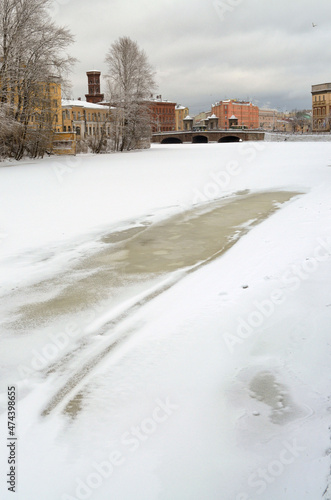 Frozen river in the city.