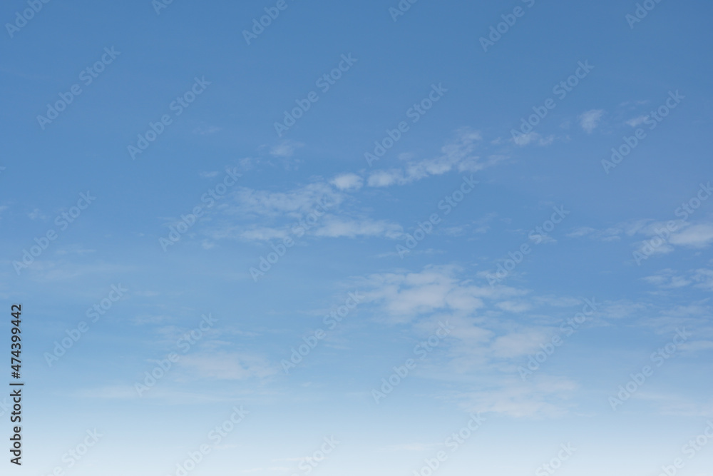 Summer Blue Sky and white clouds background. Beautiful clear cloudy in sunlight spring season. Panorama vivid cyan cloudscape in nature environment. Outdoor horizon skyline with spring sunshine.