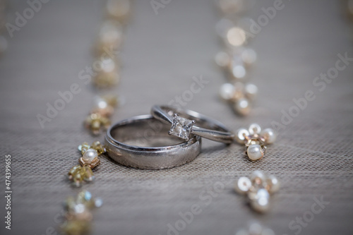 Diamond Ring. Wedding Ring | Closeup view of wedding diamond ring on a table