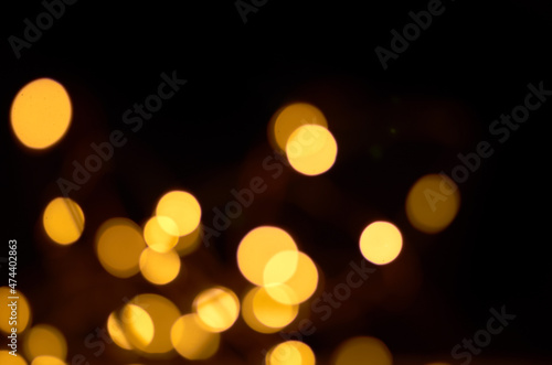 golden defocused lights on a black background
