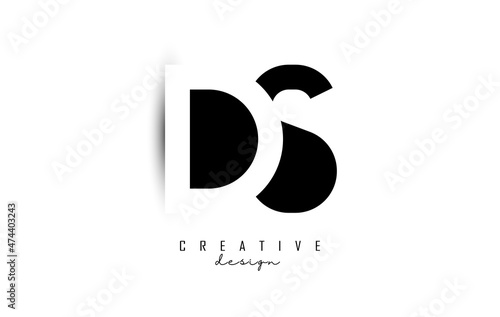 Letters DS Logo with black and white negative space design. Letters D and S with geometric typography.