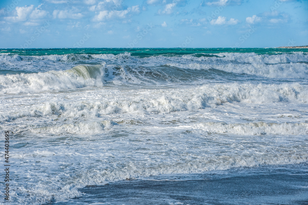A strong November wind drives roaring waves to the shore, tearing white foam from them. All the beaches of Paphos and nearby villages are flooded with stormy waters.       