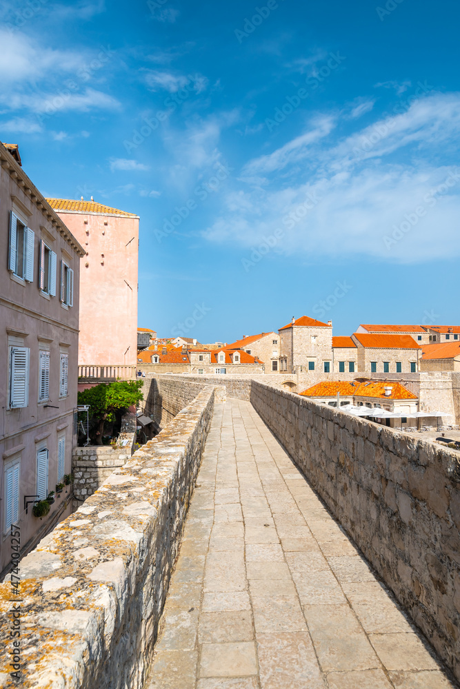 Ancient stone wall of Dubrovnik Old Town, stunning fortification system. The world famous and most visited historic city of Croatia, UNESCO World Heritage site