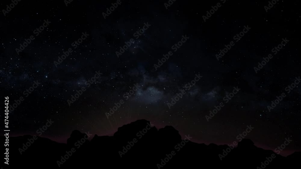 sun rise over mountains silhouette with milky way rotating in the background sun rise over mountains silhouette with milky way rotating in the background