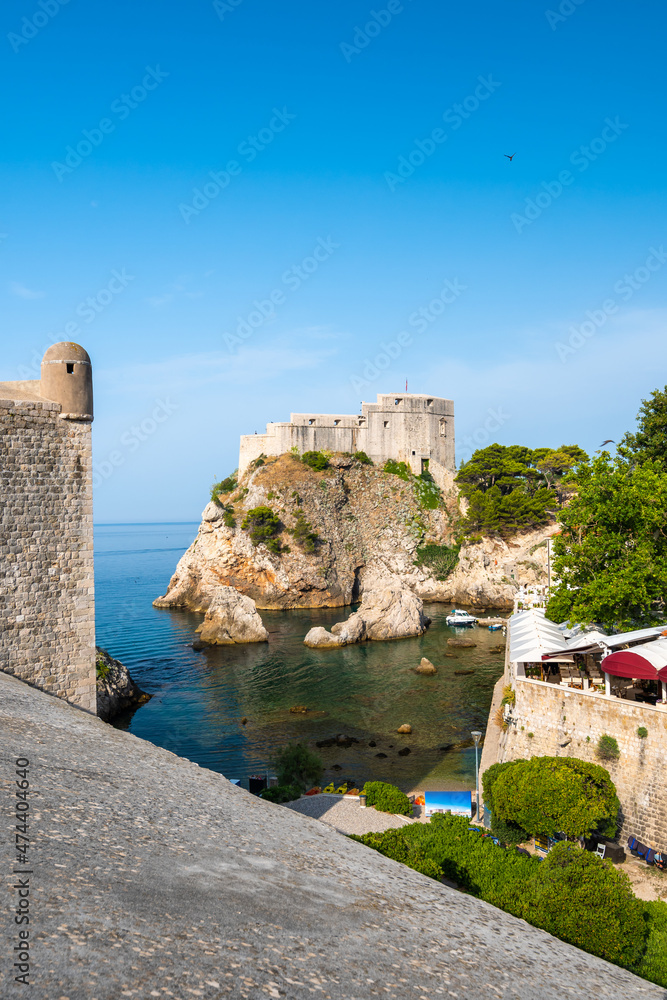 Ancient fort Lovrijenac near old city Dubrovnik. View from city wall. Sunny day, summer weather. Croatia coat near adriatic sea.