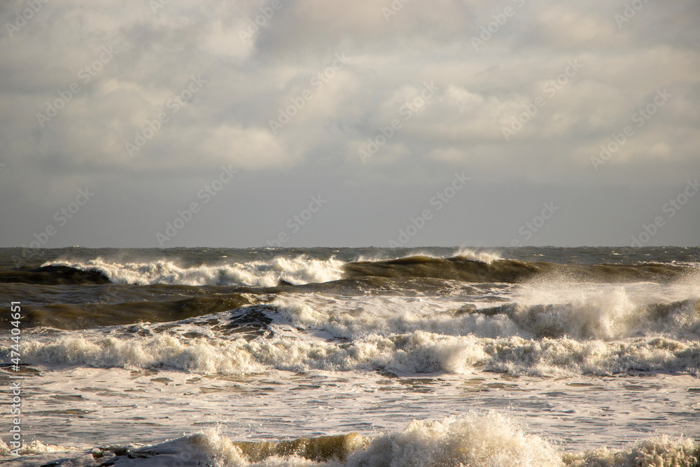 Waves crashing on a stormy day.