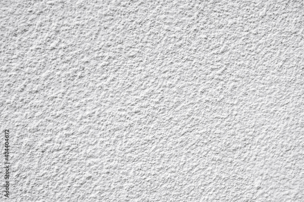 White roller or brush painted wall with texture pattern White roller or brush painted wall with texture pattern