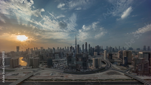Sunset over panoramic skyline of Dubai with business bay and downtown district timelapse. © neiezhmakov