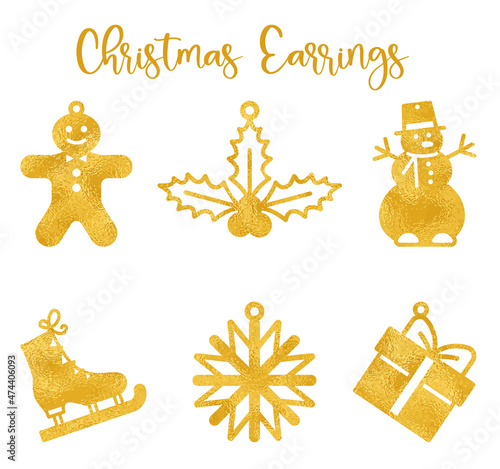 Templates of Christmas earrings made of golden foil