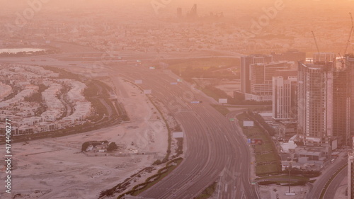 Aerial view of Al Khail road busy traffic near business bay district timelapse photo