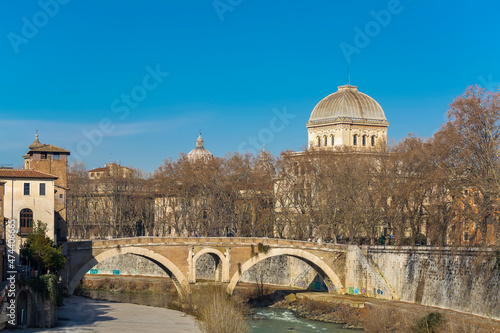 Εκτύπωση καμβά The Pons Fabricius (Fabricius' Bridge), Built in 62 BC, with the Temple of Maggi