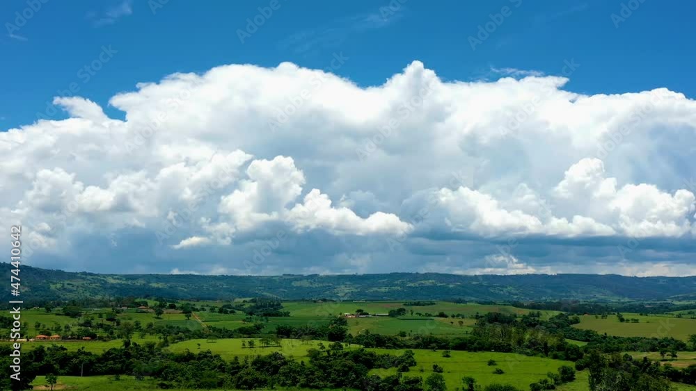 Rural landscape timelapse. Clouds timelapse at green countryside scenery. Rural landscape timelapse. Clouds timelapse at green countryside scenery.