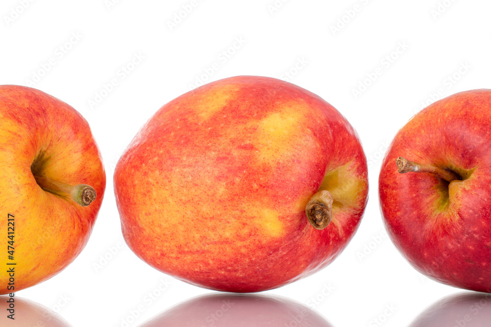 Three ripe juicy apples, close-up, isolated on white. Three ripe juicy apples, close-up, isolated on white.