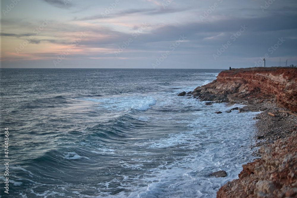 waves at sunset, rocks, beach