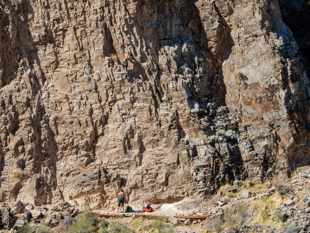 People doing rock climbing sports People doing rock climbing sports