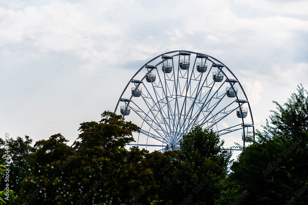 Fototapeta premium Ferris wheel from Childrens Town Park (Oraselul Copiilor), Bucharest, Romania.