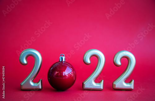 Happy new 2022 year. Christmas time. Numbers and ornament