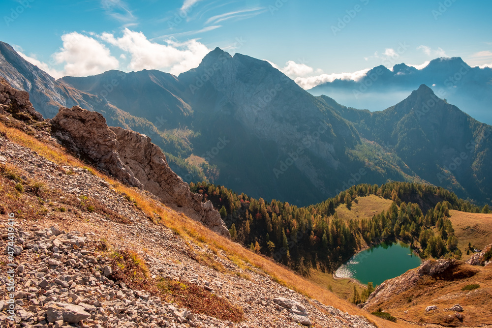 Fototapeta premium The Bordaglia lake in a colorful autumn day