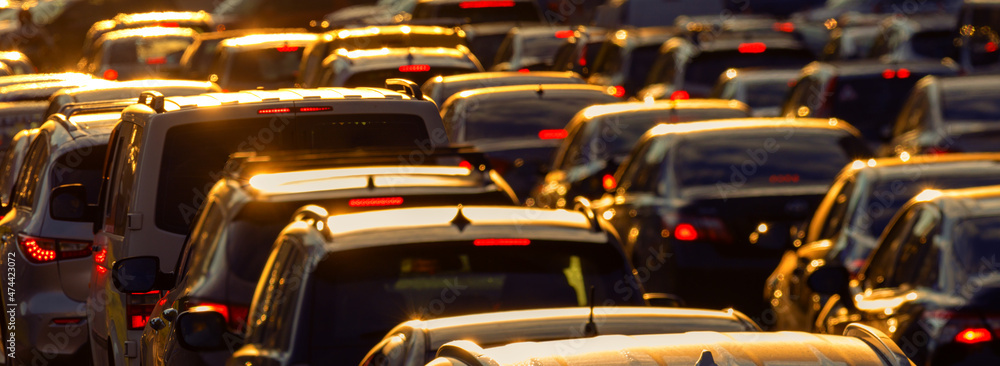 Car traffic jam at sunset selective focus. Car traffic jam at sunset selective focus.