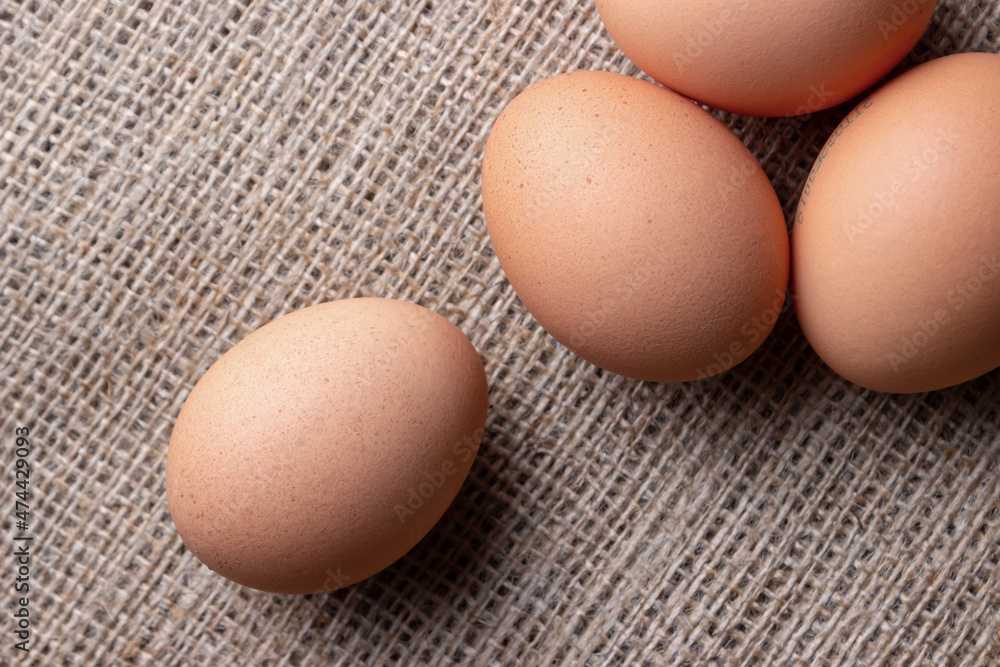 fresh eggs on jute cloth