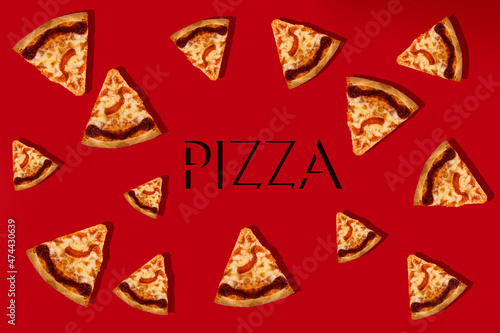 Italian pizza Margarita, cut into slices on a red background. Patern. In the middle there is an inscription pizza.