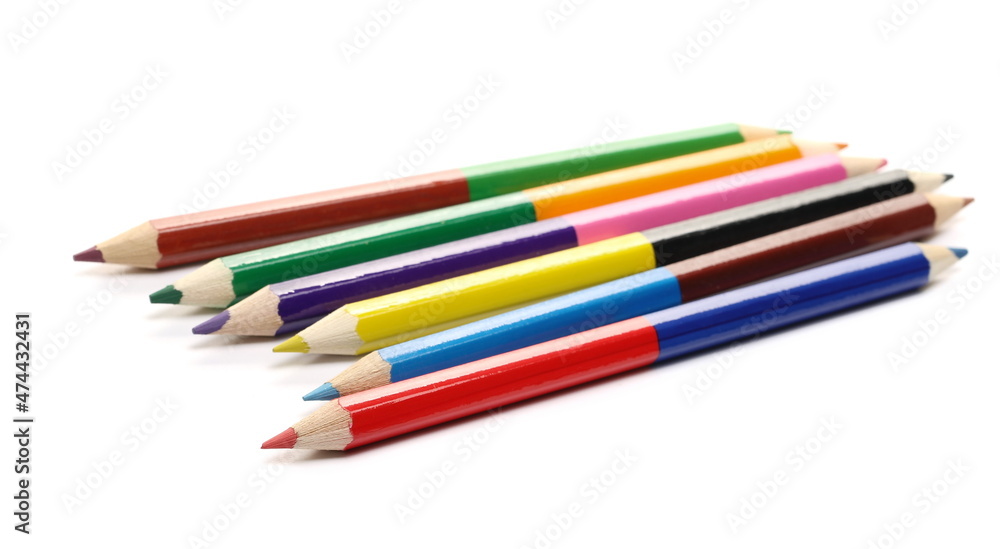 Colorful pencils set arrangement, row isolated on white background, side view