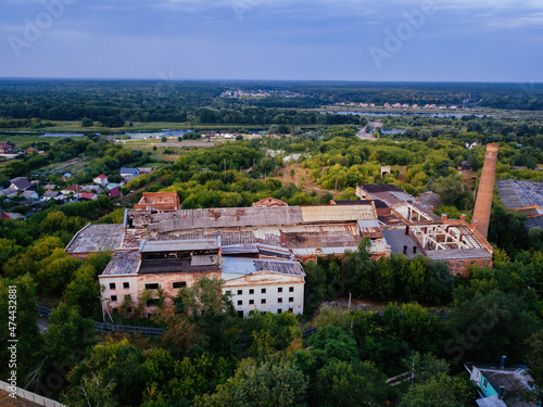 Ruined overgrown abandoned sugar factory in Ramon, aerial view