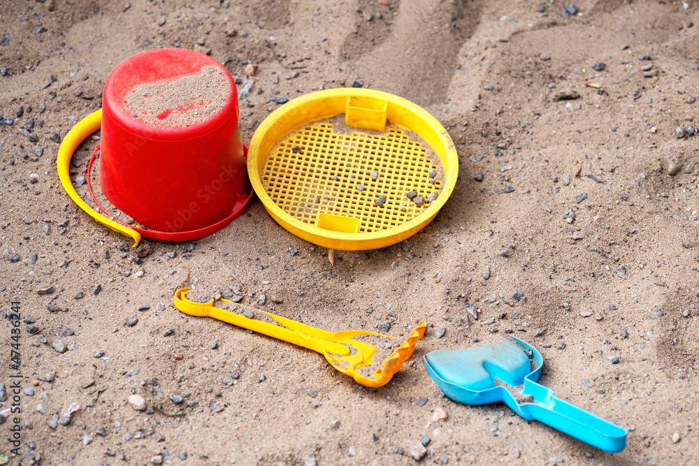 Children's sandbox with toys and an inflatable lodge. Top view. The place for a game and entertainments to children. Children's sandbox with toys and an inflatable lodge. Top view. The place for a game and entertainments to children.