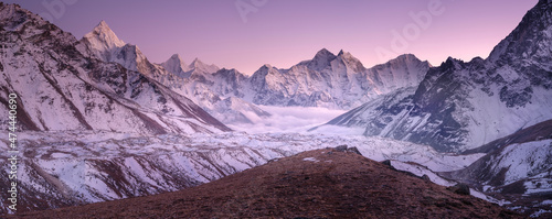 panoramic view to valley Khumbu with peaks in Nepal after sunset