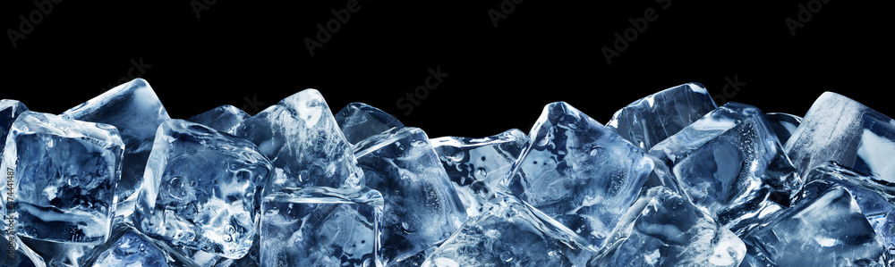 Natural ice cubes, poured horizontally at the bottom, isolated on a black background. Natural ice cubes, poured horizontally at the bottom, isolated on a black background.