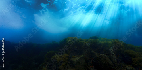 underwater scene with rays of light © Johan