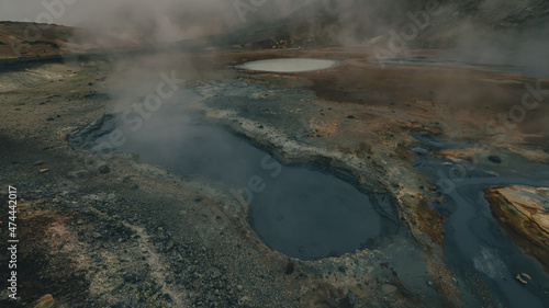 Empty geothermal Krysuvik area on Reykjanes peninsula in Iceland on early summer morning. Visible sulphur rising from the ground.