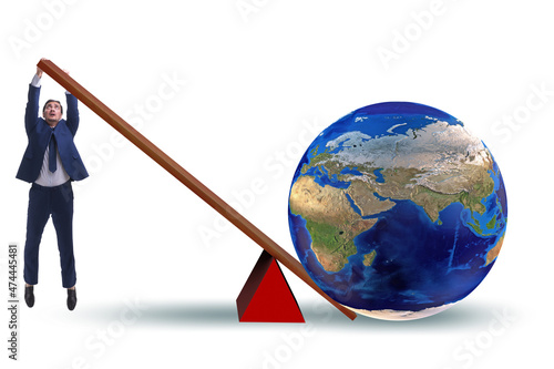 Businessman lifting the earth in challenge concept