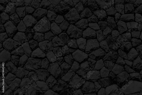 Black natural stone wall pattern and background texture