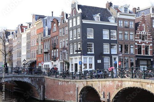 Amsterdam Canal View with Traditional Architecture and Bridge, Netherlands