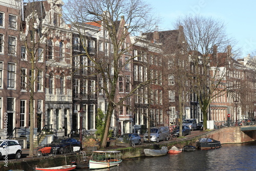 Amsterdam Singel Canal View with Traditional Architecture and Boats, Netherlands