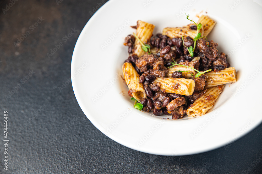 pasta alla arrabiata beans and vegetables pasta healthy meal diet snack on the table copy space food background rustic. top view veggie vegan or vegetarian food no meat