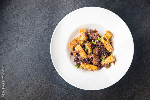 pasta alla arrabiata beans and vegetables pasta healthy meal diet snack on the table copy space food background rustic. top view veggie vegan or vegetarian food no meat