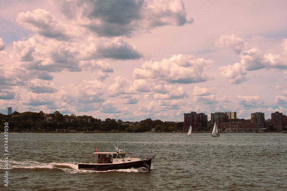 Naklejka premium boat on the river