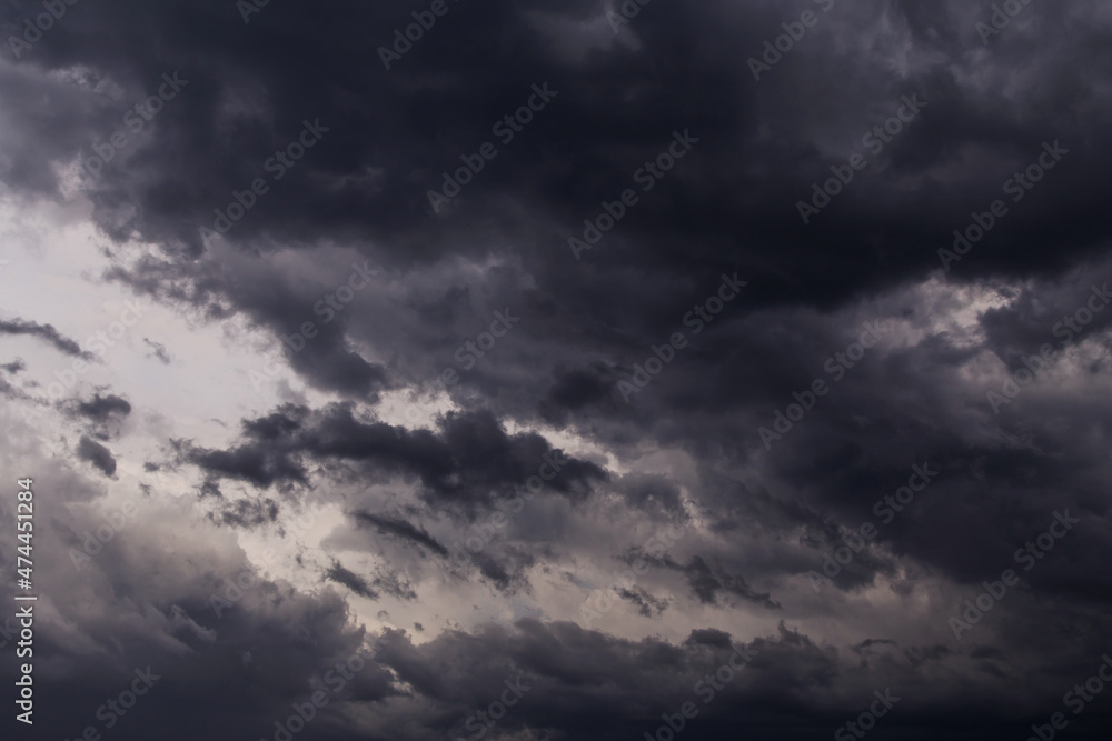 Epic Storm sky with dark cumulus clouds abstract background texture, thunderstorm